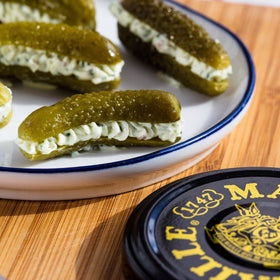 Maille Cornichons Original in a tasting jar ready to snack.