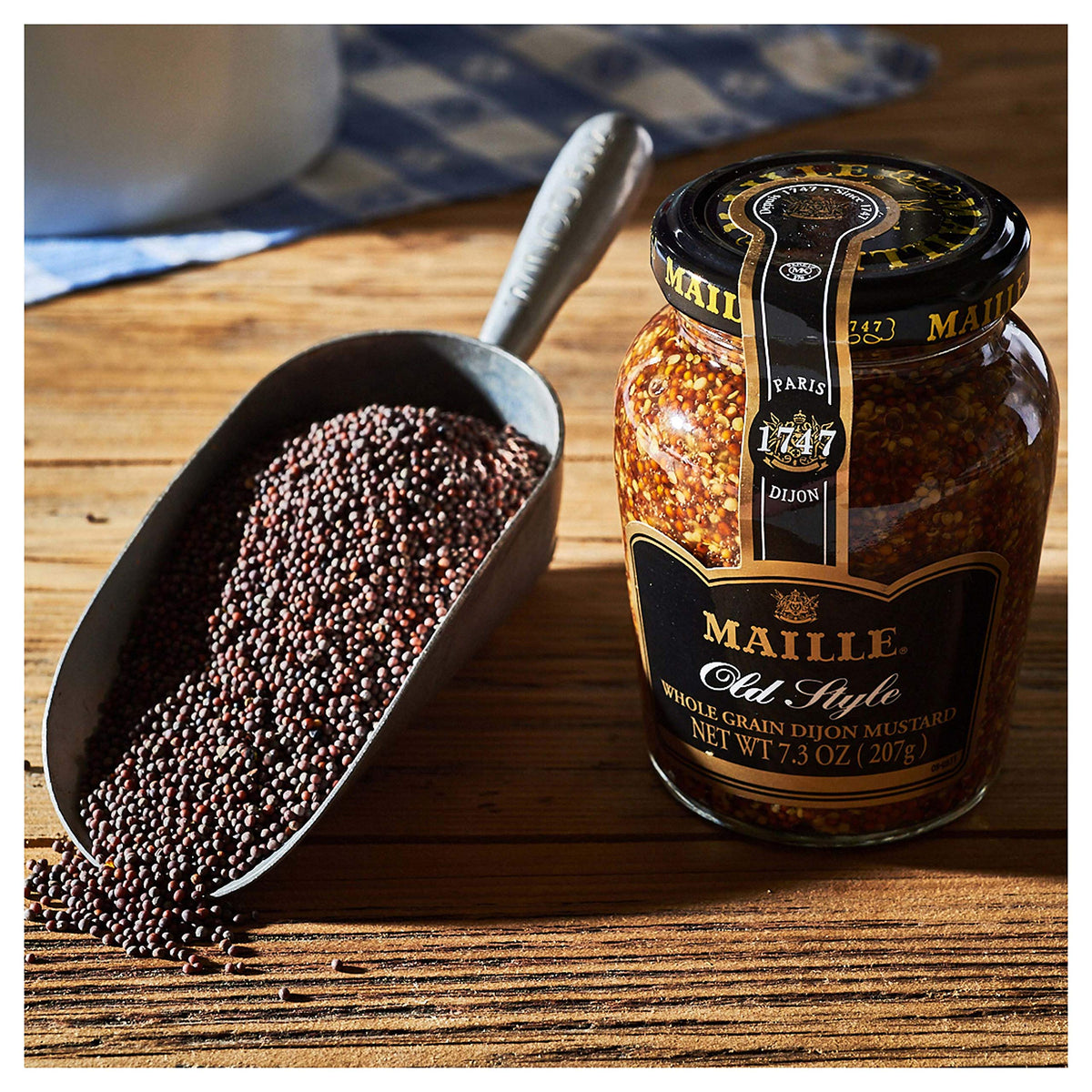 Maille Old Style Dijon mustard sits ready for everyday cooking versatility.