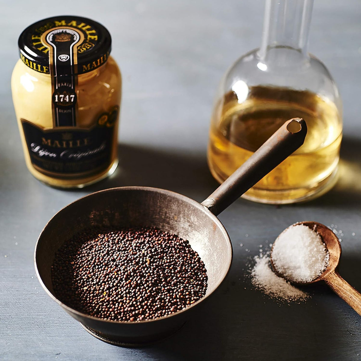 Maille Dijon Originale No Added Sulfites jar side, creamy texture ready to spread.