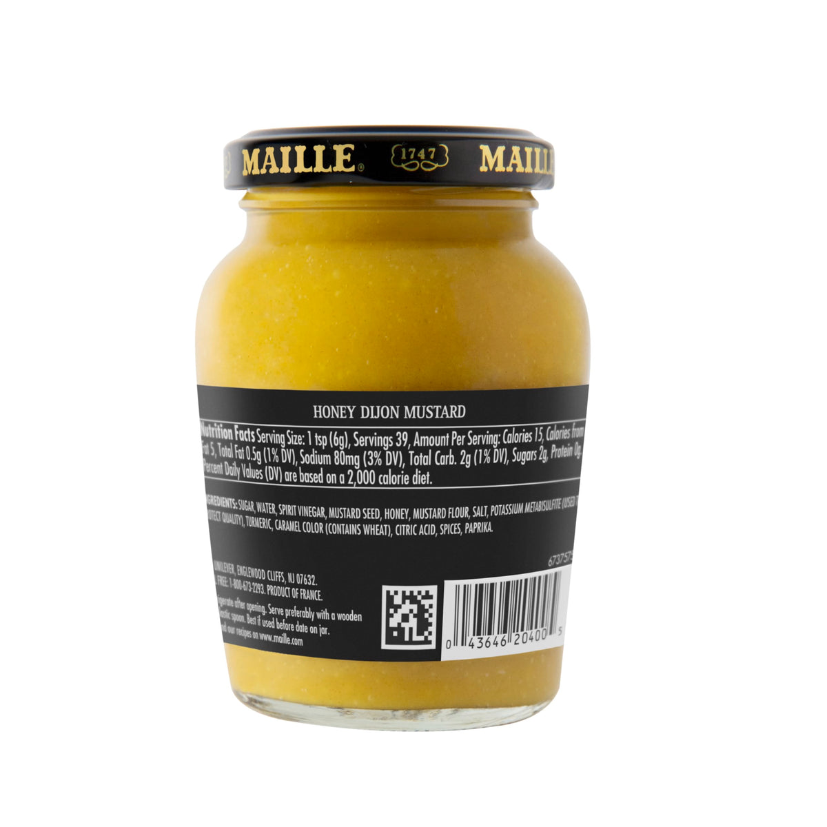 Maille Honey Dijon bottle pour highlights glossy glaze for roasted vegetables