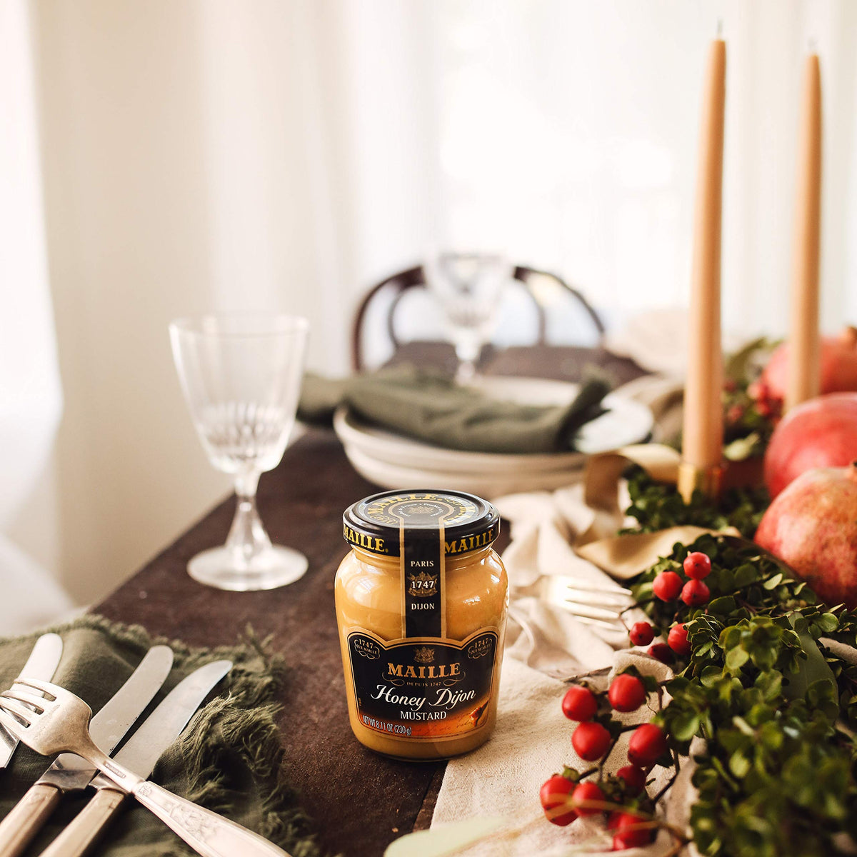 Maille Honey Dijon glaze over vegetables highlighting sweet and Dijon heat.