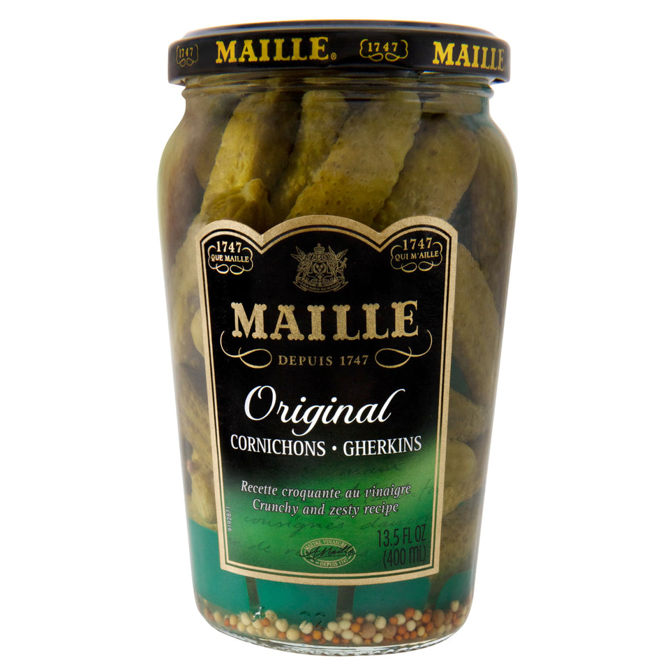 Maille Cornichons Original jar with tart gherkins for gourmet garnish.
