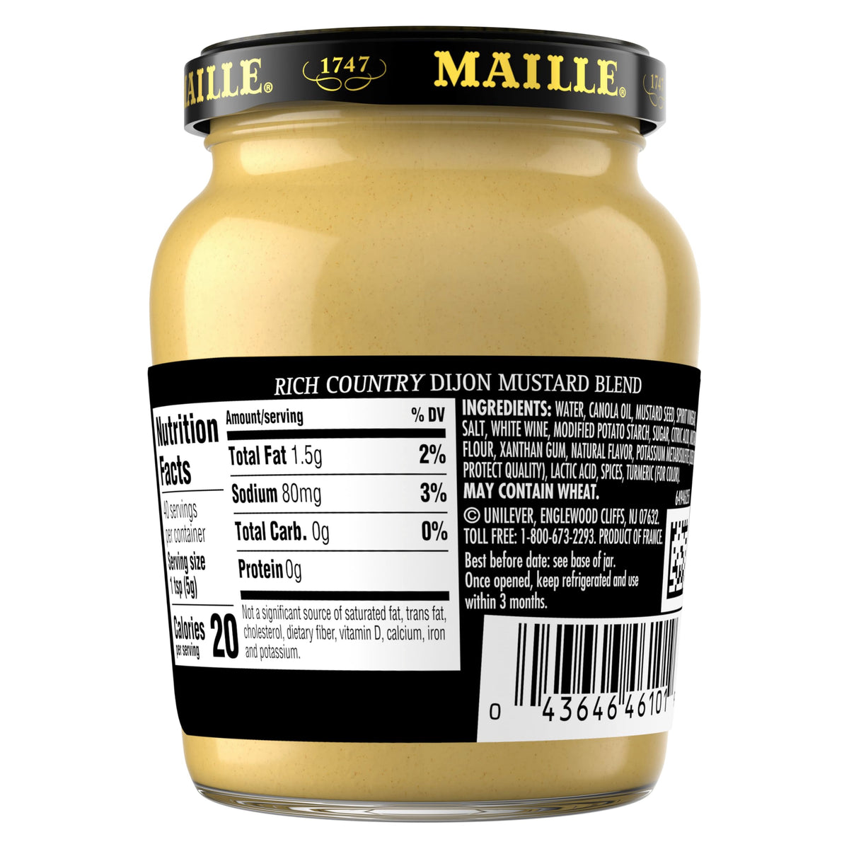 Creamy texture close-up of Maille Rich Country Dijon on a sandwich spread.