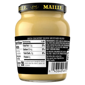 Creamy texture close-up of Maille Rich Country Dijon on a sandwich spread.