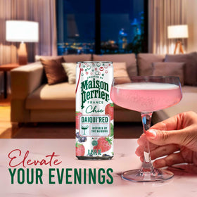Glass with Maison Perrier Chic Daiqui’Red over ice shows vibrant red fruit bubbles