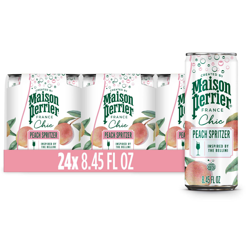 Maison Perrier Chic Peach Spritzer bottle being poured, a crisp, low-calorie mocktail feel.