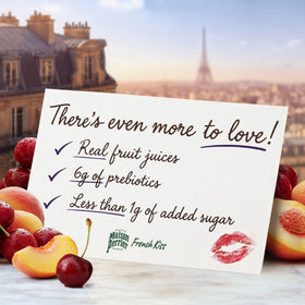 Maison Perrier French Kiss label closeup emphasizes Parisian craft behind each can.