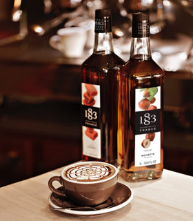 Maison Routin 1883 Blackberry Syrup bottle on a countertop