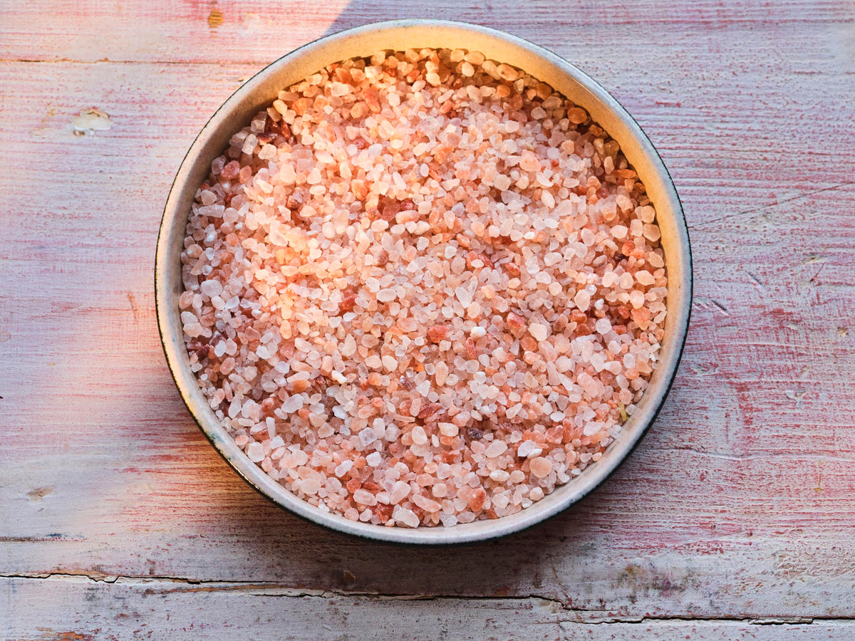 Close-up of Maldon Himalayan pink salt crystals showing natural pink hue.