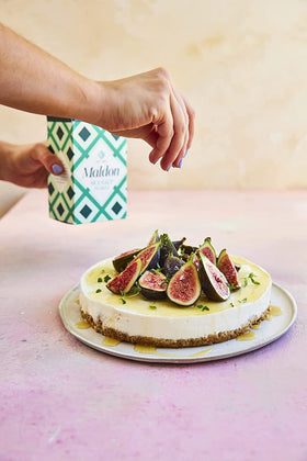 Maldon salt flakes on a dish, adding clean flavor and texture as a finishing touch.