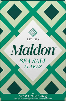 Maldon Sea Salt flakes close-up showing texture, perfect for table seasoning.
