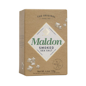 Maldon pyramid crystal flakes close-up, showcasing delicate texture and precise saltiness.