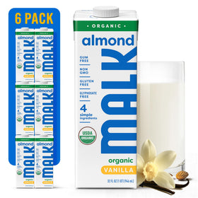 MALK Vanilla Almond Milk bottle poured into coffee for a creamy start