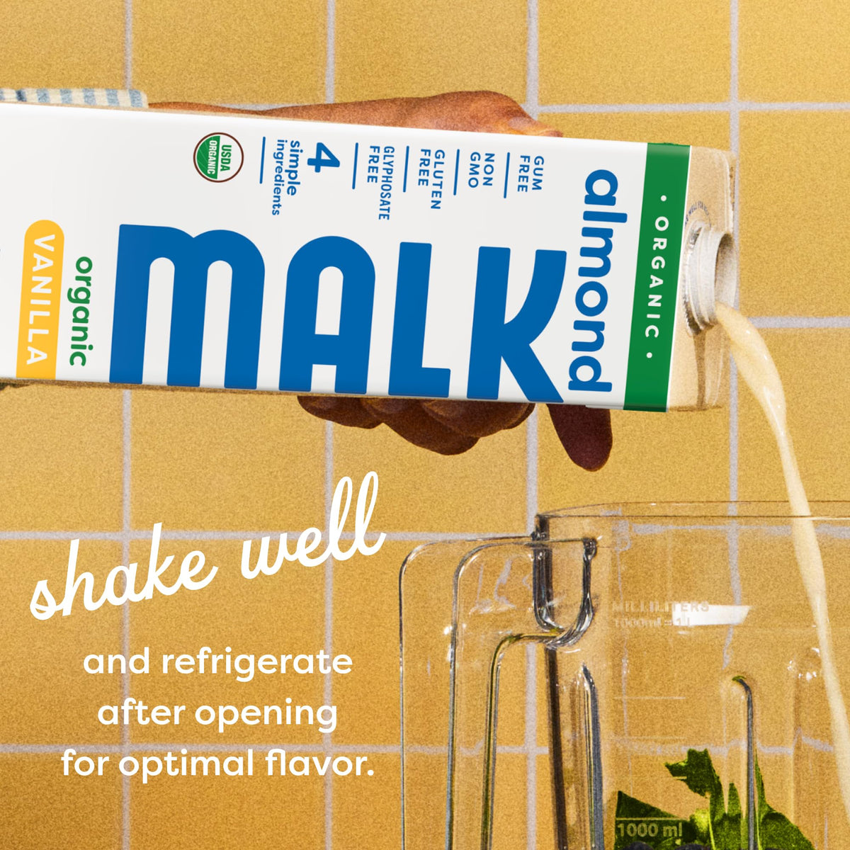 MALK Vanilla Almond Milk being poured over cereals for dairy-free crunch