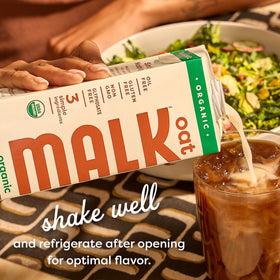 MALK Oat Milk ingredients label highlights three simple components: oats, water, pink salt.