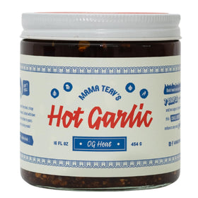 Mama Teav's Hot Garlic Chili Crisp jar highlights smoky heat and crispy garlic.