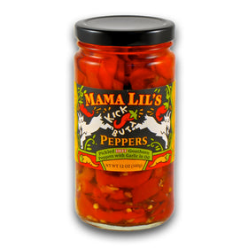 Mama Lil’s Kick Butt Goathorn peppers in oil jar closeup for bold heat
