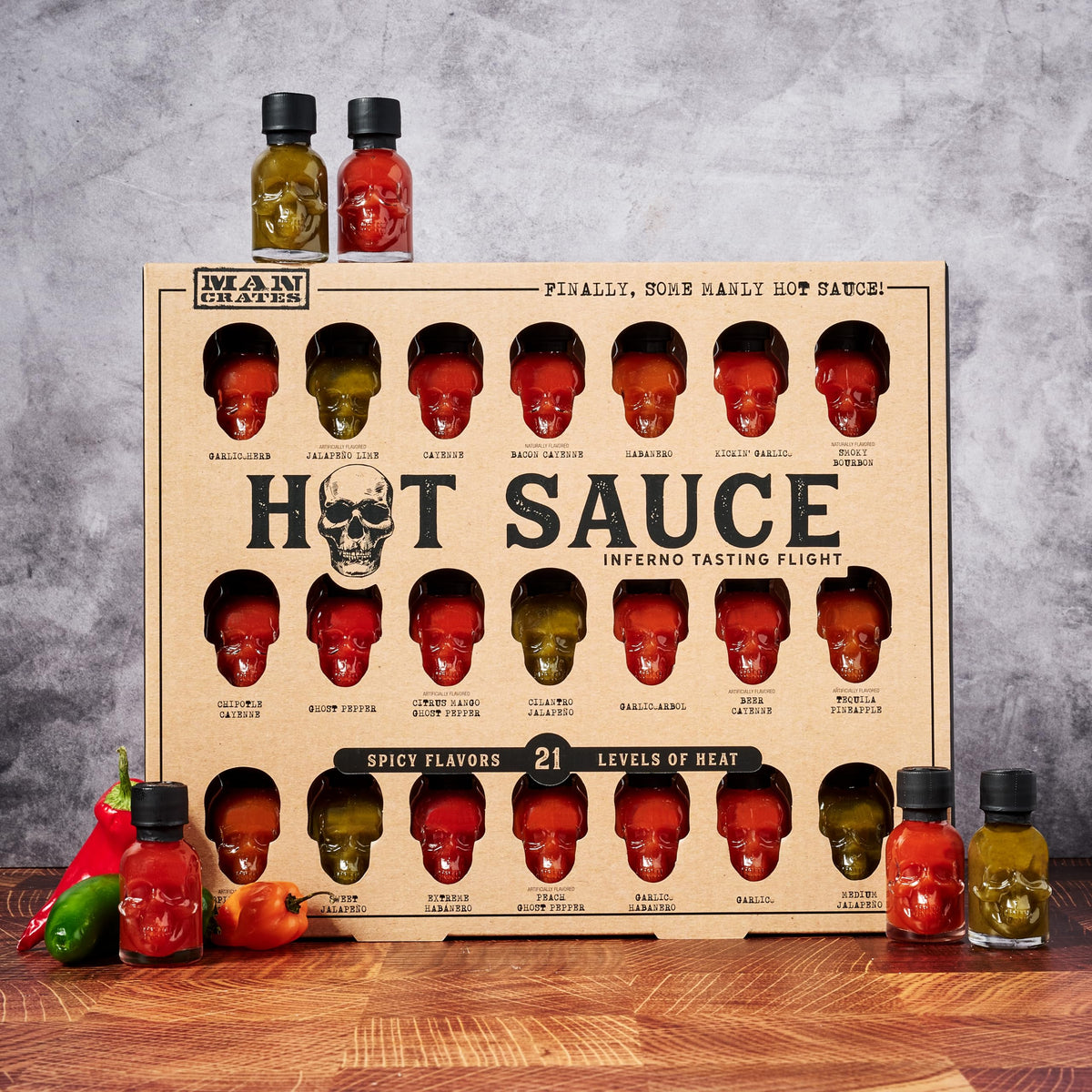 Man Crates Hot Sauce Inferno Flight enables spicy challenges without commitment to large bottles.