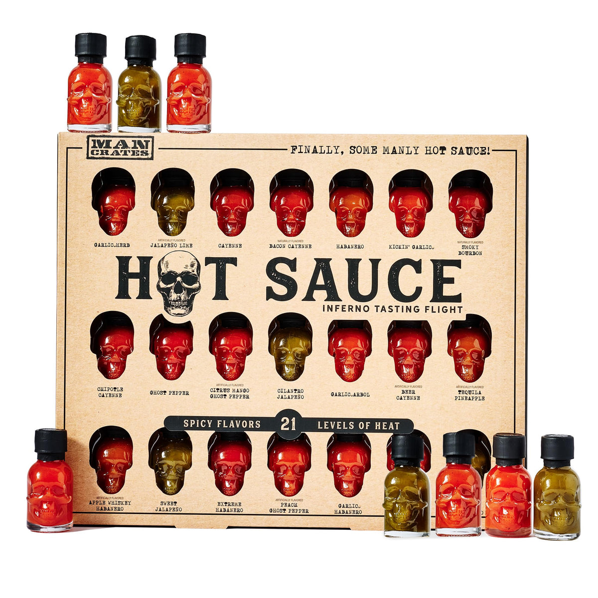 Man Crates Hot Sauce Inferno Flight skull bottles on display-ready collection.