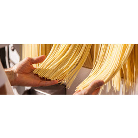 Mancini pastificio rigatoni on kitchen counter ready to cook.