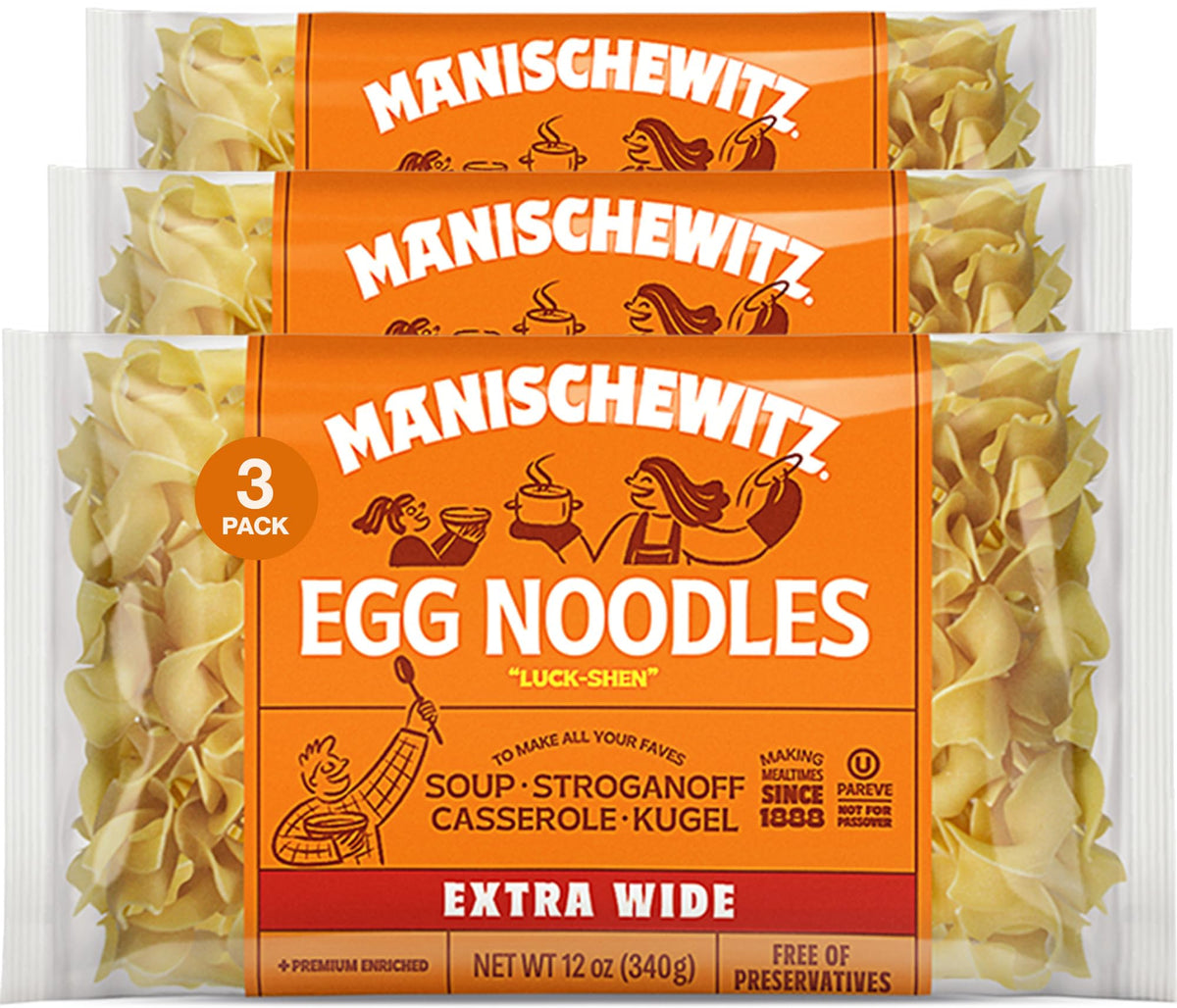 Manischewitz Extra Wide Egg Noodles in a bowl, ideal for comforting homestyle soups.