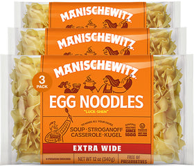 Manischewitz Extra Wide Egg Noodles in a bowl, ideal for comforting homestyle soups.
