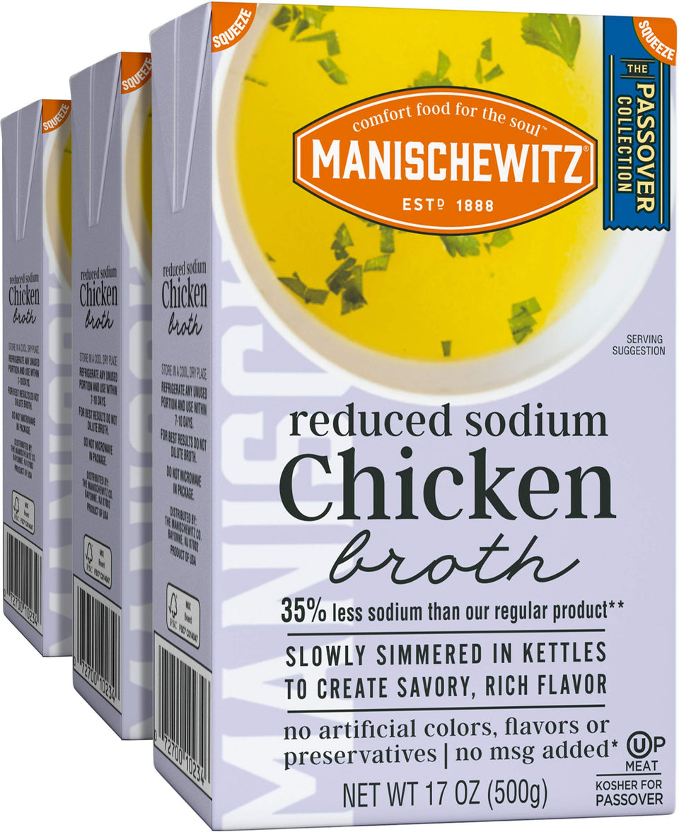 Manischewitz reduced-sodium chicken broth pour, adds savory depth to soups