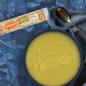 Manischewitz Split Pea Soup simmering in a pot demonstrates a quick comforting meal.
