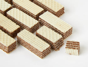 Manner Original Neapolitaner wafers pack-12 on shelf inviting sharing and convenient snacking.
