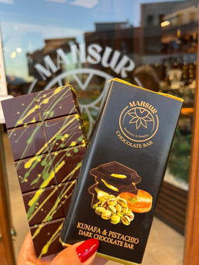 MANSUR Dubai chocolate bar with pistachios and kunafe for rich snacking pleasure.
