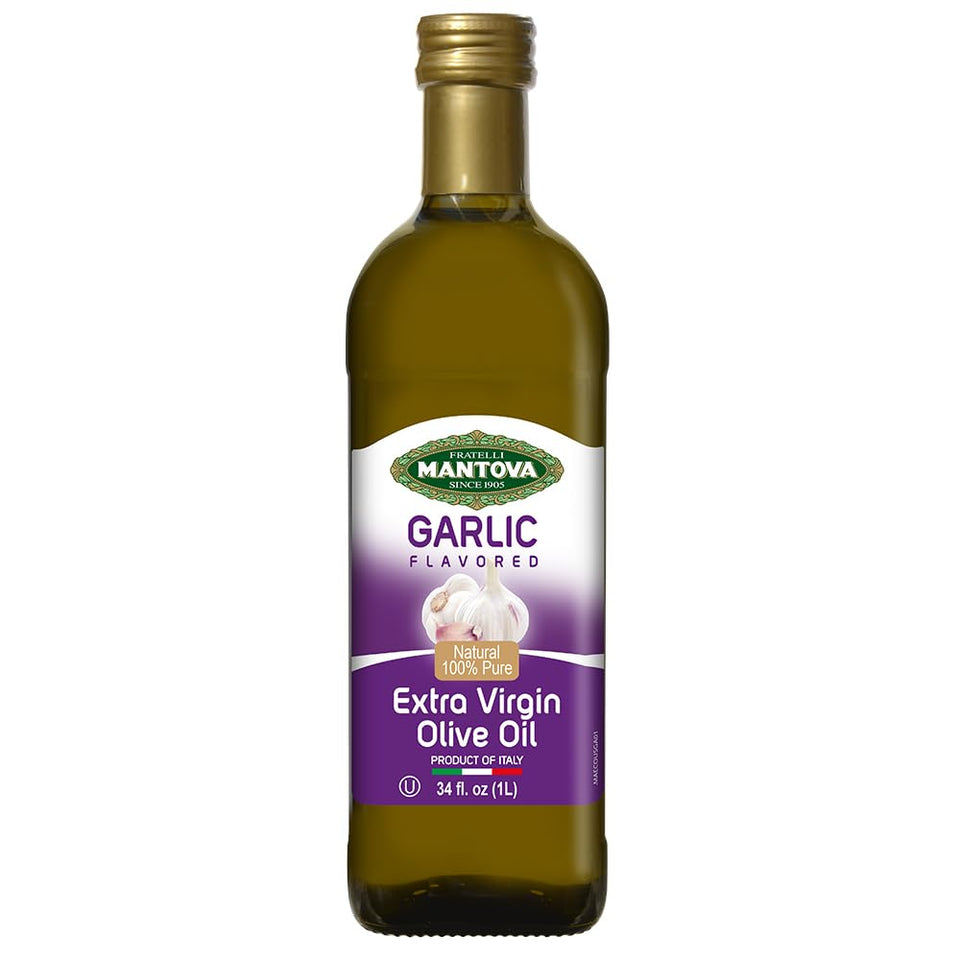 Mantova Garlic EVOO bottle being poured for rich salad dressing.