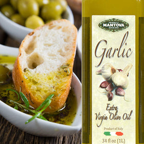 Fresh garlic visible in Mantova EVOO bottle close-up.