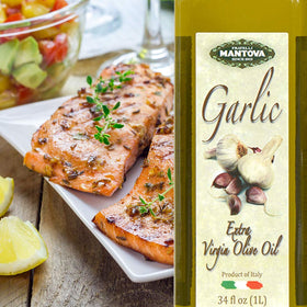 Salad greens drizzled with Mantova Garlic EVOO for brightness.