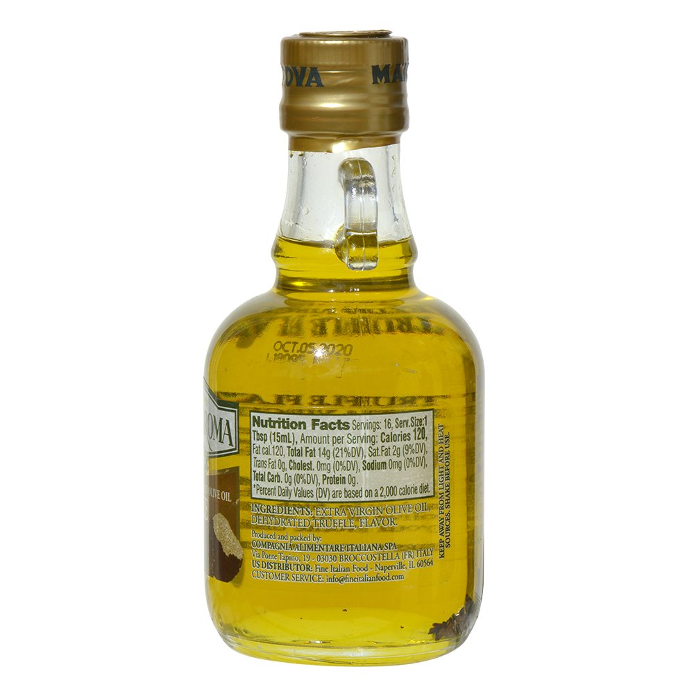 Pouring Mantova Grand’Aroma truffle oil for a quick drizzle over a dish