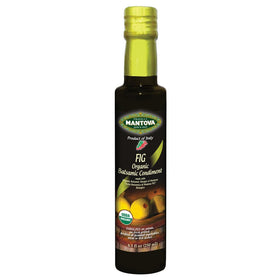 Mantova Organic Fig Balsamic Vinegar of Modena bottle pour enhances salads with balanced sweetness and aroma.