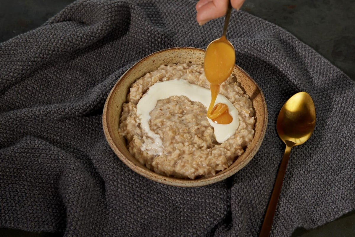 Pure raw Manuka Health honey with rich aroma for natural sweetening.
