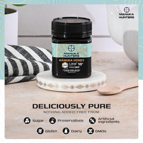 Honey drizzling into tea from Manuka Hunters for rich flavor.