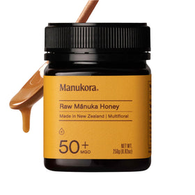Manukora Raw Manuka Honey MGO 50+ jar with rich caramel cream texture