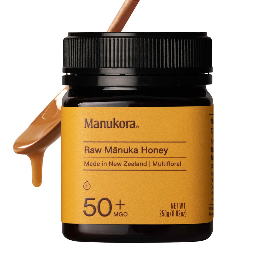 Manukora Raw Manuka Honey MGO 50+ jar with rich caramel cream texture