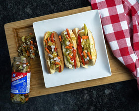 Marconi Mild Giardiniera peppers and veggies in a jar, adds zesty crunch.