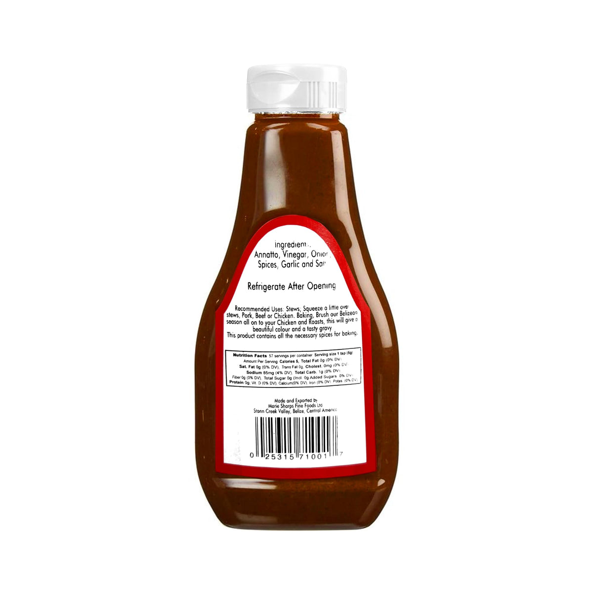 Marie Sharp's Belizean Season-All being poured over meat for a savory, juicy finish