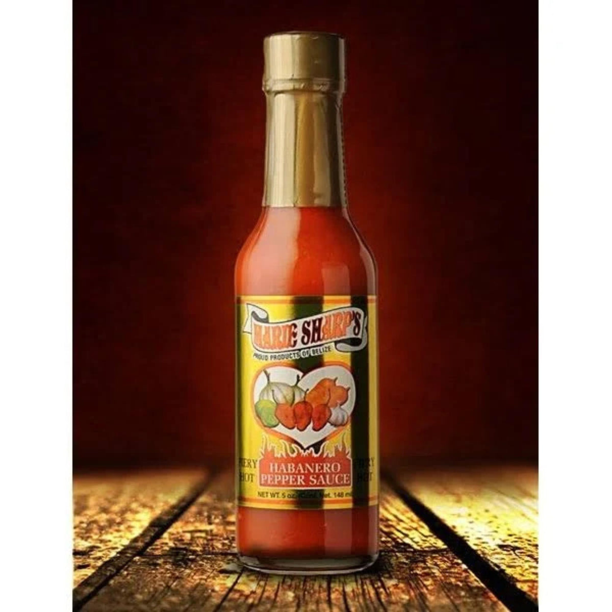 Wings brushed with Marie Sharp's Fiery Hot Habanero Sauce for a spicy finish.