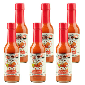 Marie Sharp's Hot Habanero bottle front shows Belizean flavor, ideal for eggs and tacos