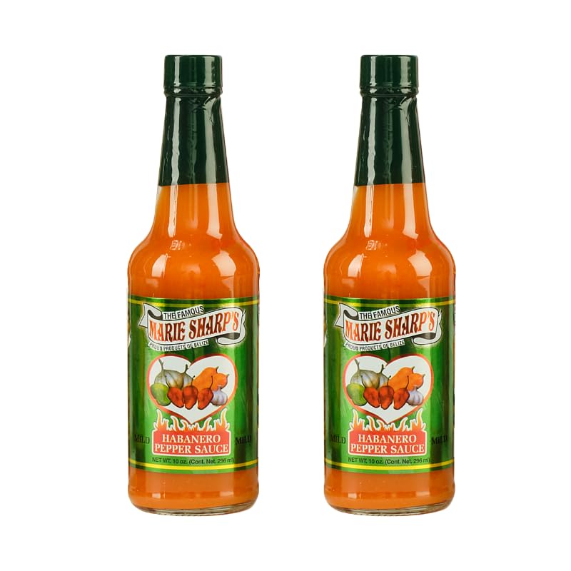Marie Sharp's Mild Habanero sauce bottle closeup with vibrant peppers.