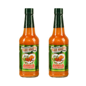 Marie Sharp's Mild Habanero sauce bottle closeup with vibrant peppers.