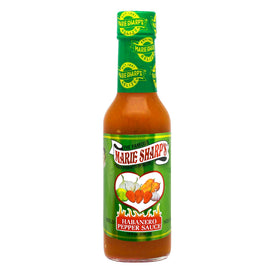 Marie Sharp's Mild Habanero sauce bottle pour ready to spice.