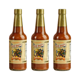 Marie Sharp's smoked habanero sauce bottle enhances grilled meats with bold smoky heat