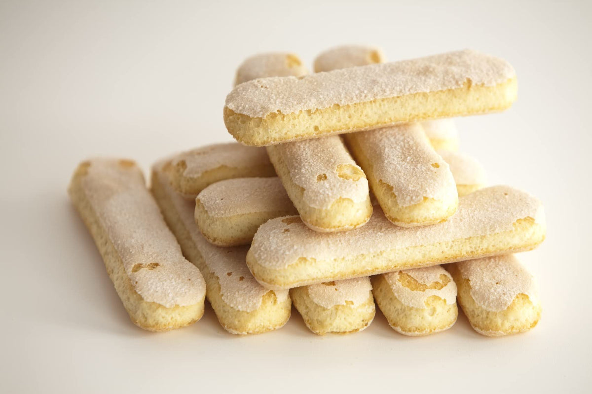 Marini Savoiardi crumbly sponge texture close-up, perfect for dipping in coffee