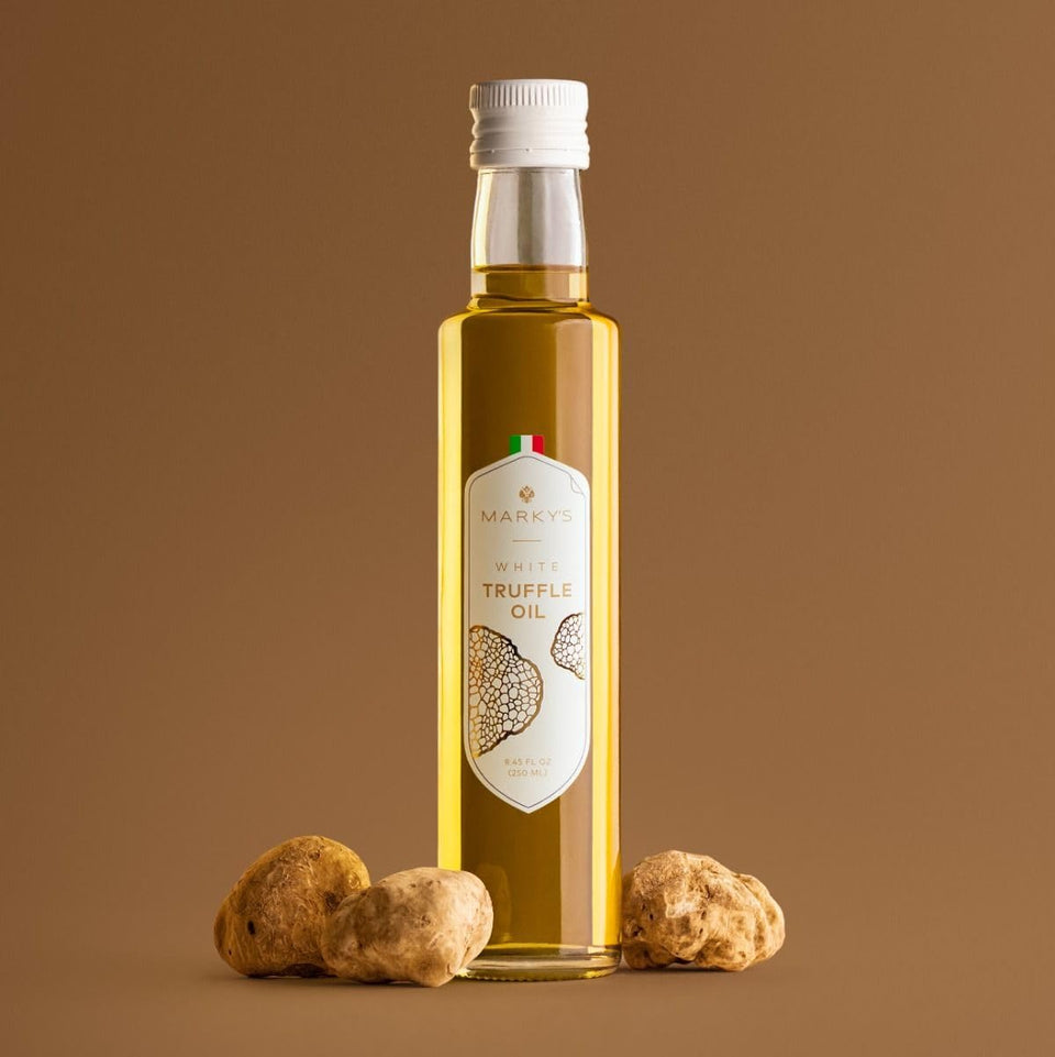 MARKY'S Italian White Truffle Oil bottle for finishing dishes with garlicky aroma.