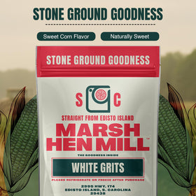 Marsh Hen Mill White Grits breakfast bowl with spoon highlighting comforting texture.